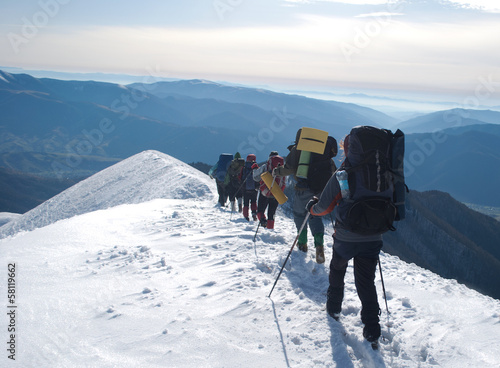 hikers in a winter mountain