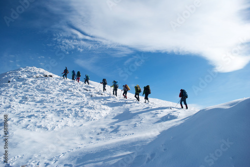 hikers in a winter mountain