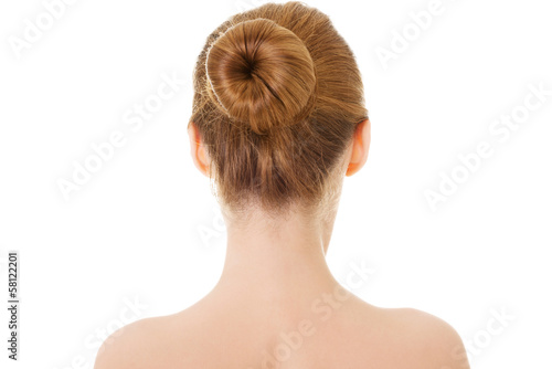 Naked woman's back- head and shoulders.