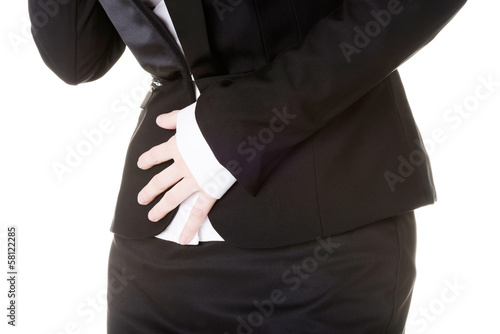 Business woman holding her stomach.