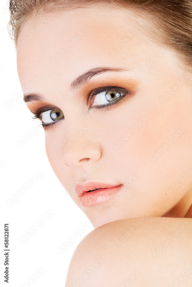 Fototapeta premium Attractive young woman's face. Closeup.