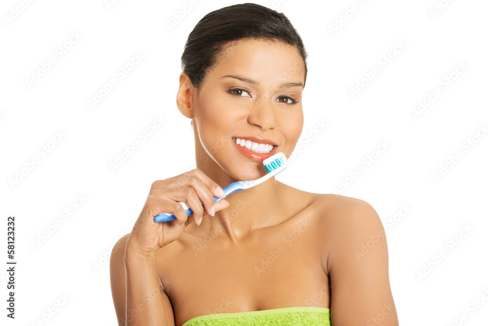 Attractive naked woman with toothbrush. Attractive naked woman with toothbrush.