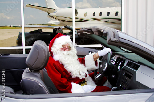 Santa sitting in convertible