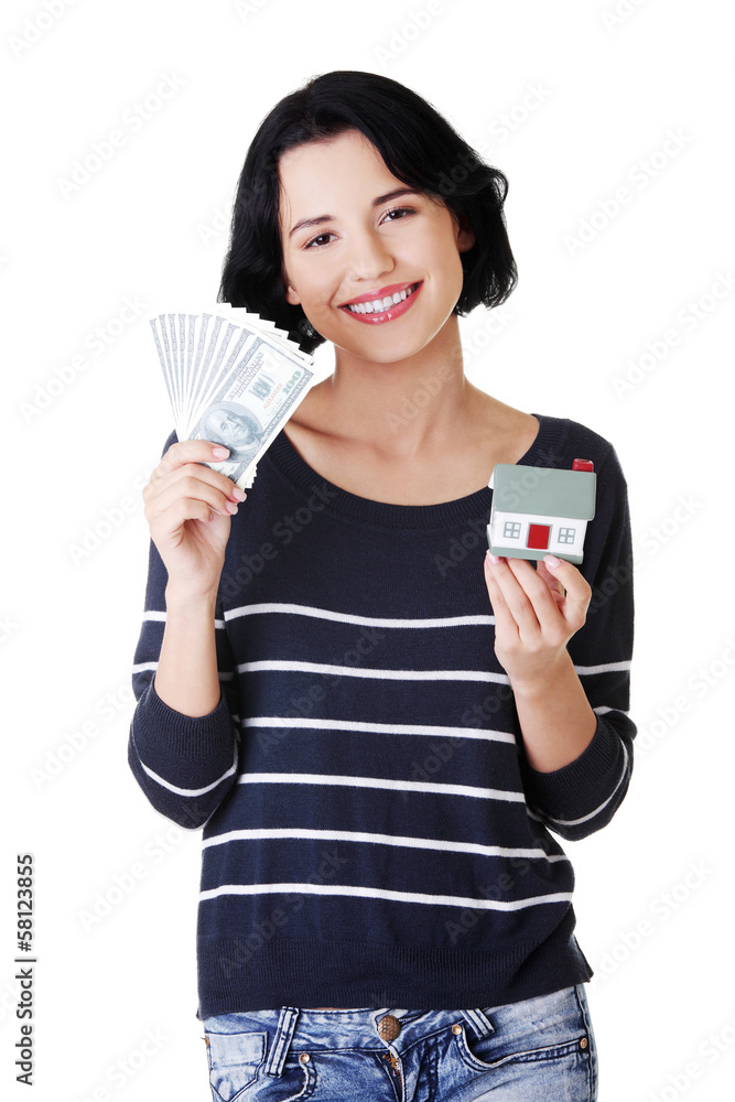 Attractive girl with money and house on hands. Attractive girl with money and house on hands.