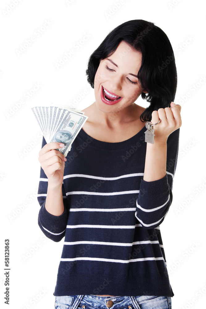 Attractive girl with money and house on hands. Attractive girl with money and house on hands.