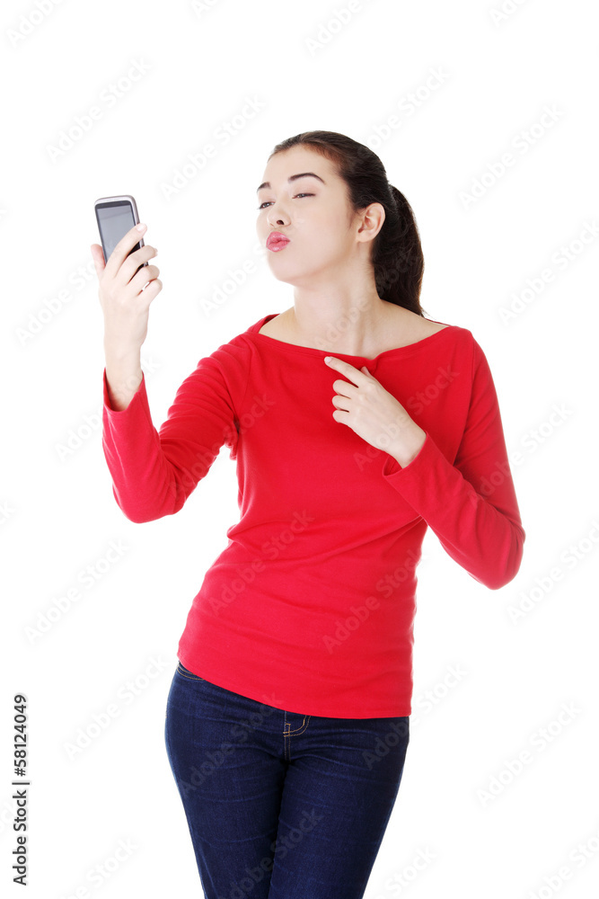 Attractive casual woman with cellphone. Attractive casual woman with cellphone.
