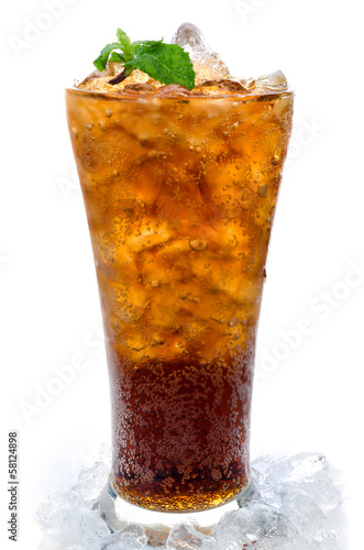 Cola with ice in a glass photo