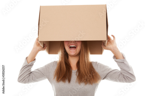 Happy girl and carton box