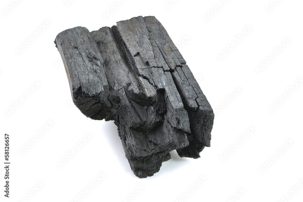 Obraz premium Piece of fractured wood coal on white background