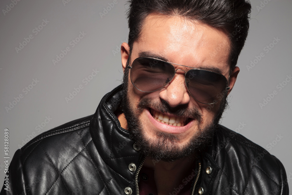 Obraz premium bad boy with long beard fooling aroung making faces