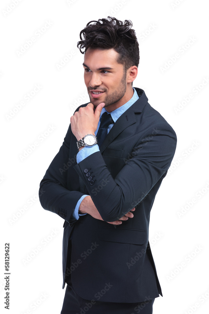 side view of a young pensive business man side view of a young pensive business man