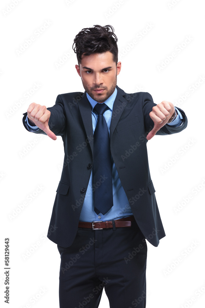 young business man with thumbs down hand gesture young business man with thumbs down hand gesture