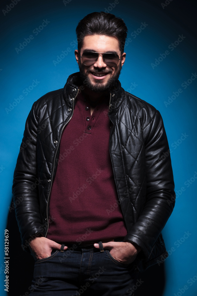 Fototapeta premium man in leather jacket is laughing for the camera