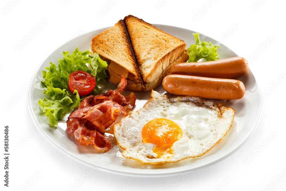 English breakfast - toast, egg, bacon and vegetables English breakfast - toast, egg, bacon and vegetables