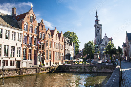 Statue of medieval painter Jan van Eyck in Bruges, Belgium.. © addufek