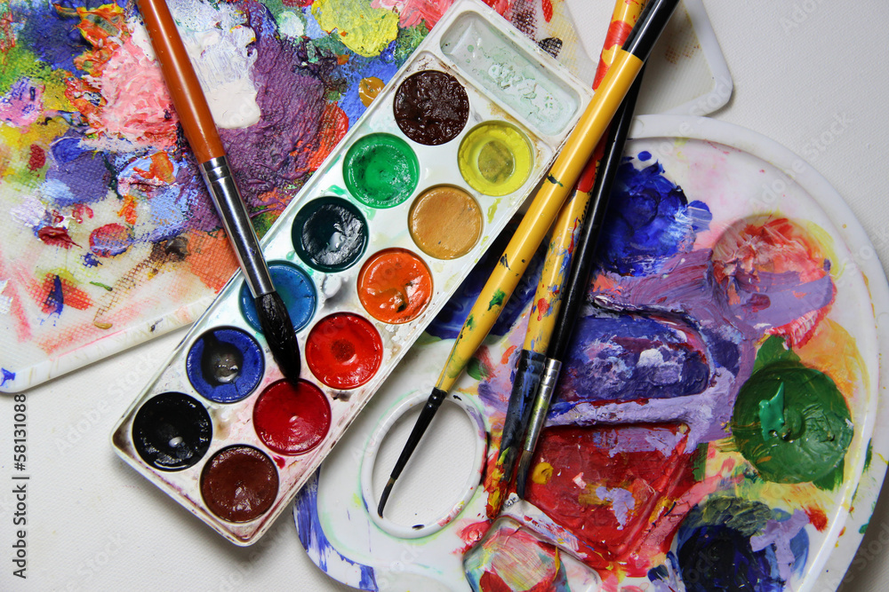 Art palette and mix of paintbrushes Art palette and mix of paintbrushes