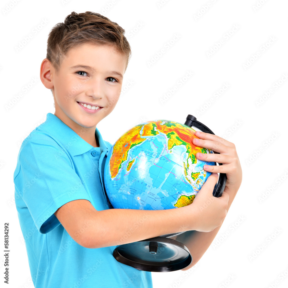 Smiling boy in casual holding globe in hands Smiling boy in casual holding globe in hands