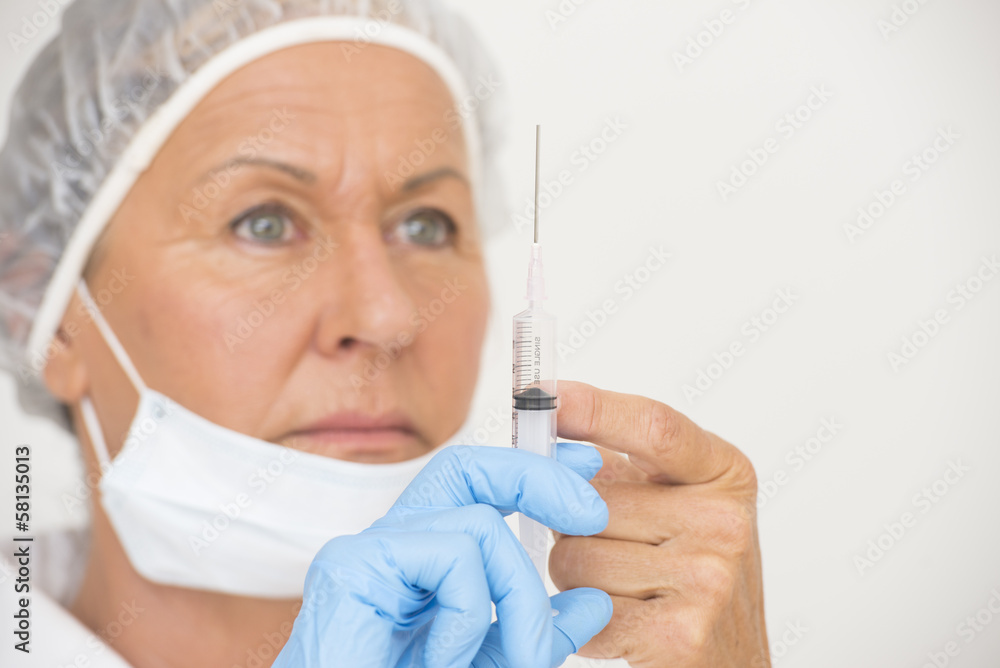 Female nurse with injection vaccination Female nurse with injection vaccination