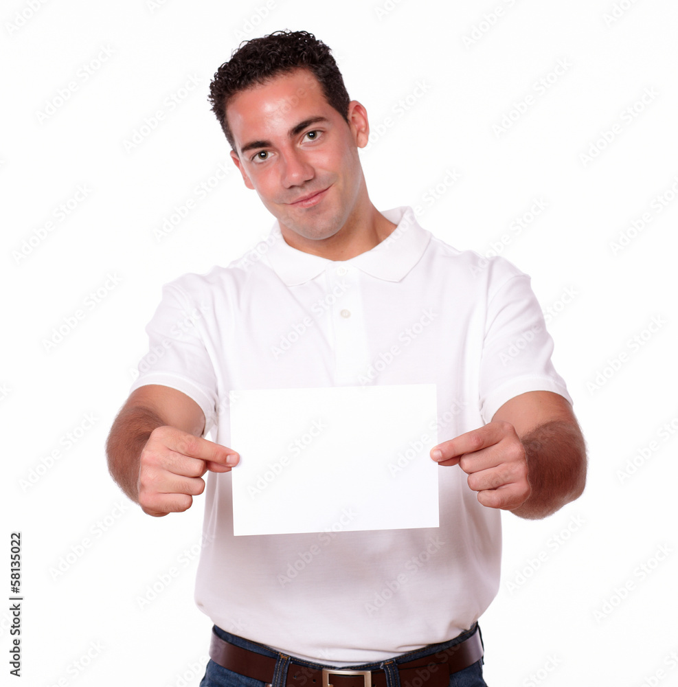 Charismatic man standing holding a blank card Charismatic man standing holding a blank card