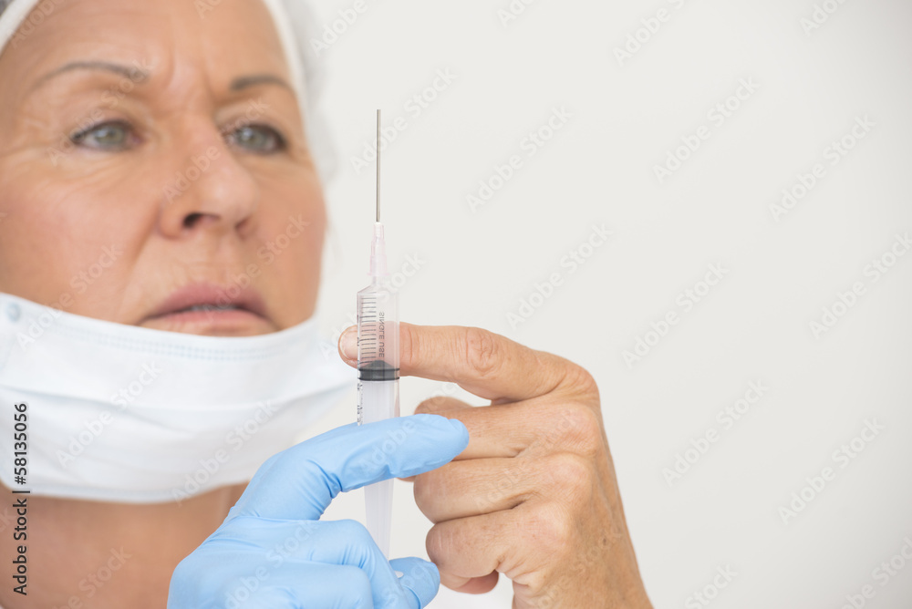 Nurse with Flu vaccination in injection Nurse with Flu vaccination in injection