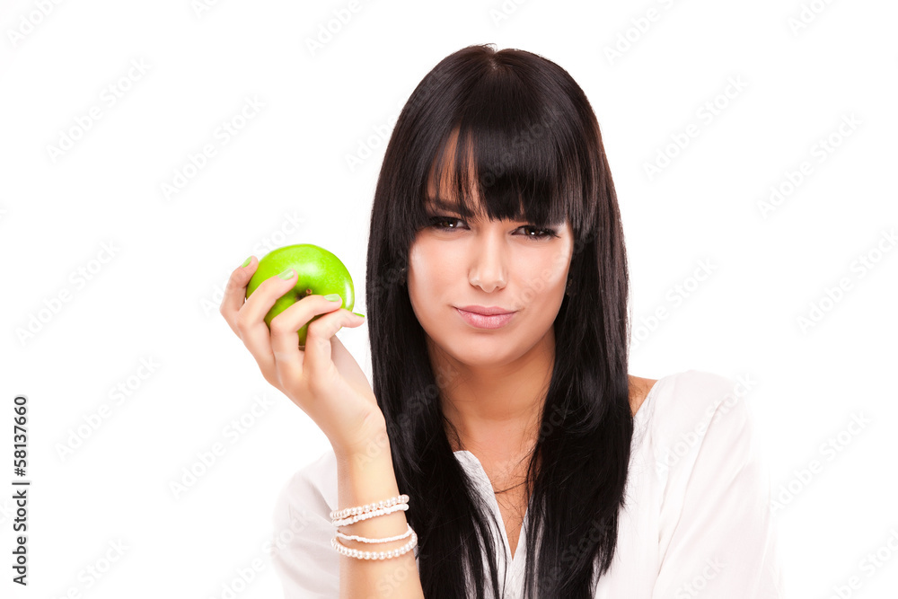 beautiful brunette woman with green apple on white background beautiful brunette woman with green apple on white background