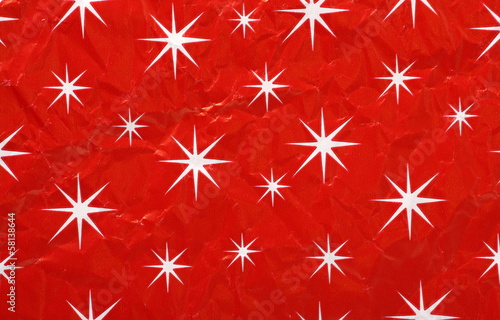 Christmas Wrapping Paper of white stars on red photo