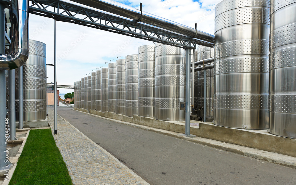 Modern aluminum barrels where grape juice is aged into wine