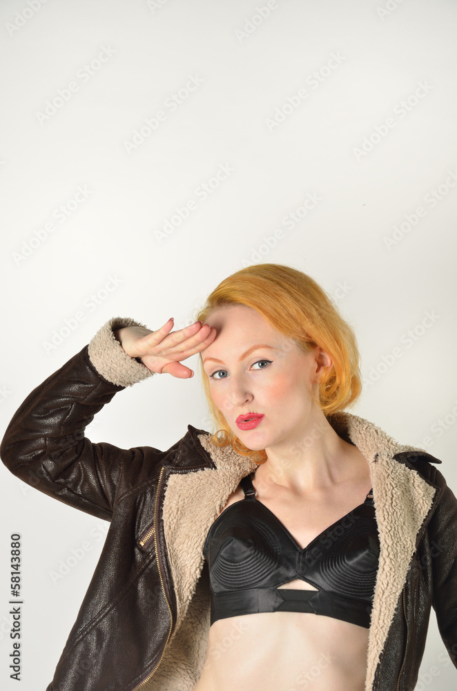 Fototapeta premium Saluting Red Head in jacket