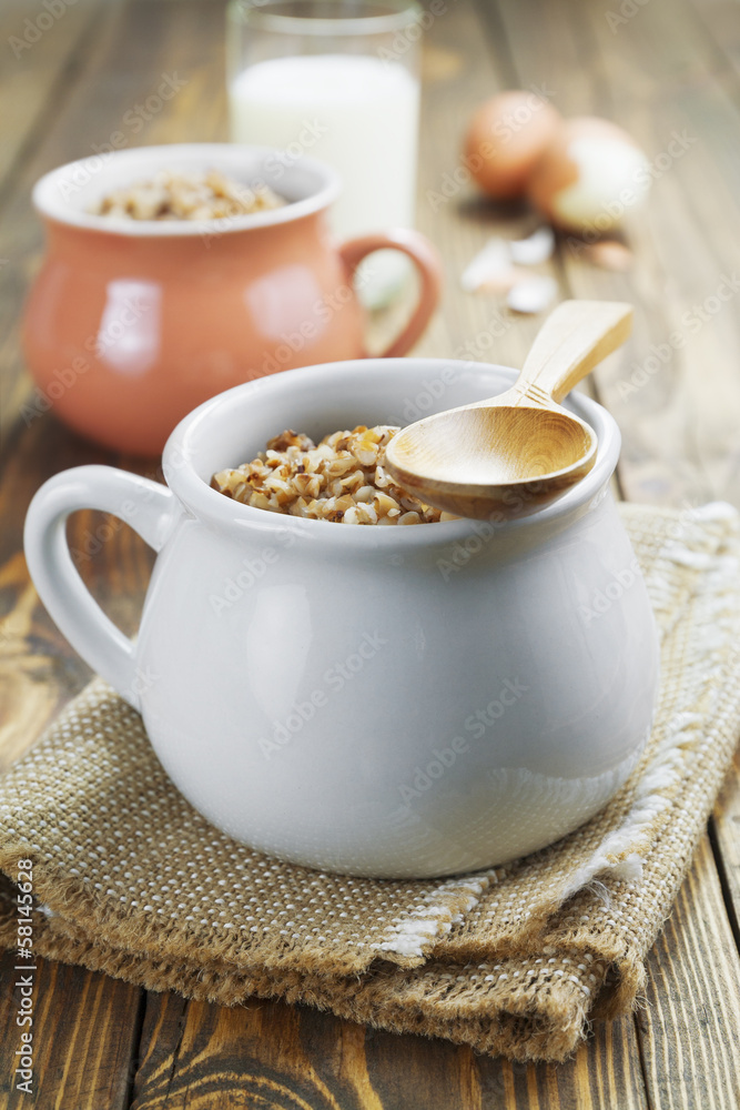 Fototapeta premium Buckwheat porridge, milk and eggs