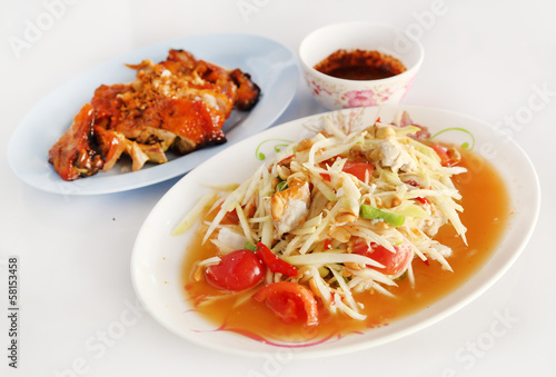 spicy papaya salad and roasting chicken