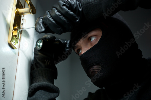 Thief Burglar opening  door photo