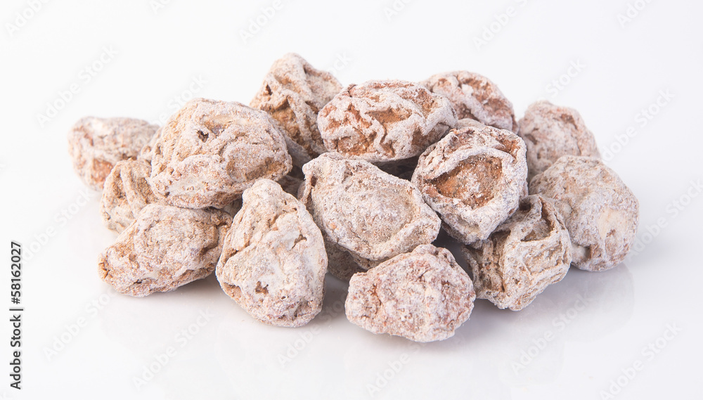 Salted Plum Tamarind Food Snack on a Background Salted Plum Tamarind Food Snack on a Background