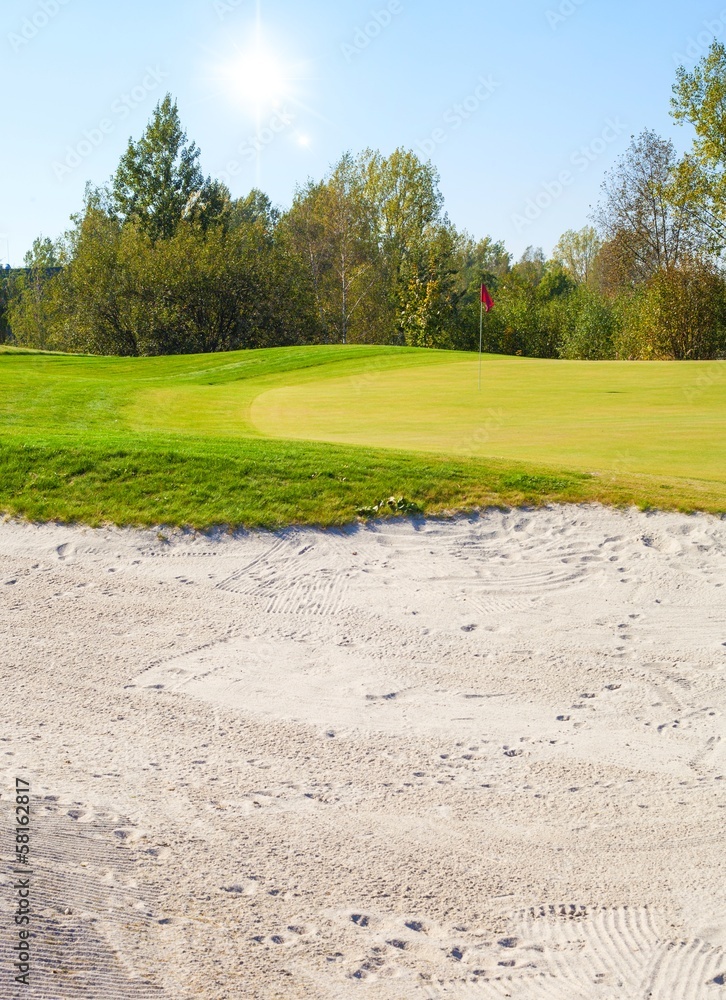 Golf course landscape view, field and sand bunker Golf course landscape view, field and sand bunker