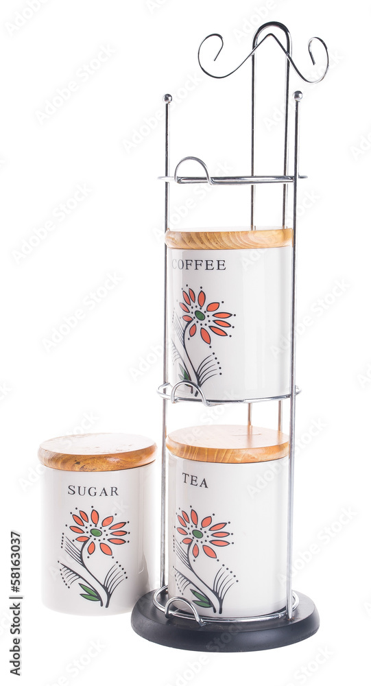 Fototapeta premium Tea coffee and sugar cannisters isolated against on white backgr