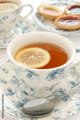 Photography Earl Grey tea in floral bone china and a slice of lemon