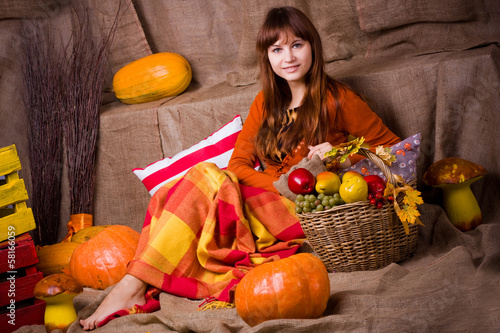 Young pretty woman sits