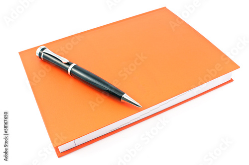 Pen on  red notebook isolated on white
