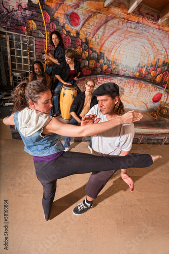 Capoeira Instructor Teaching Kicks
