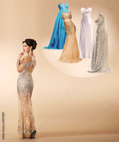 Young woman thinking which dress to wear on New Year's party . photo