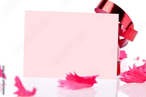 red ribbon and pink card