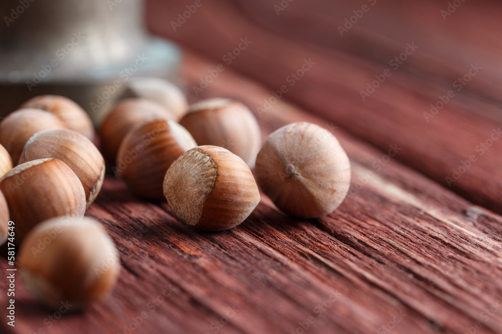Hazelnuts, filbert on old wooden background Hazelnuts, filbert on old wooden background
