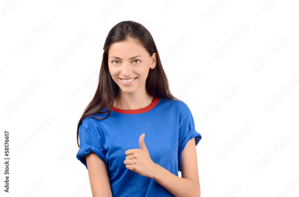 Happy girl with blue t-shirt signing thumbs up. Happy girl with blue t-shirt signing thumbs up.