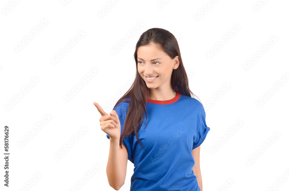 Attractive girl with blue t-shirt pointing to the side. Attractive girl with blue t-shirt pointing to the side.