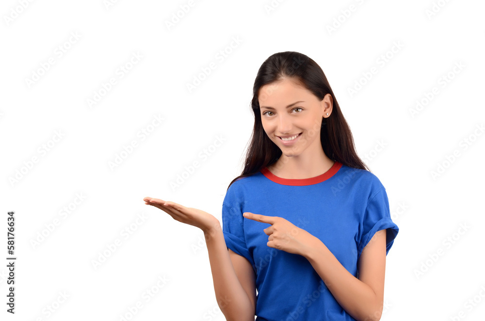 Beautiful girl in blue t-shirt pointing and showing. Beautiful girl in blue t-shirt pointing and showing.
