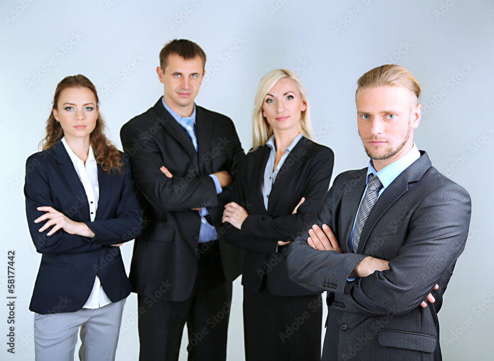 Group of business people on gray background Group of business people on gray background