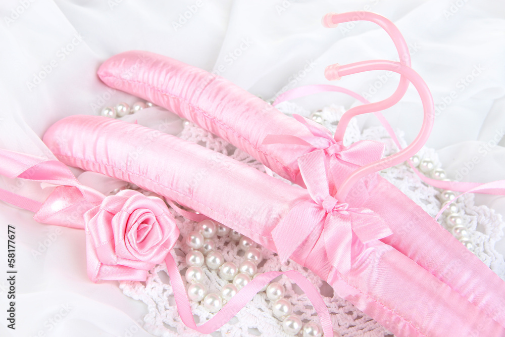 Beautiful hanger on fabric background Beautiful hanger on fabric background