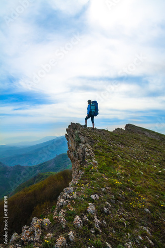 woman on top of the rock © Kotangens