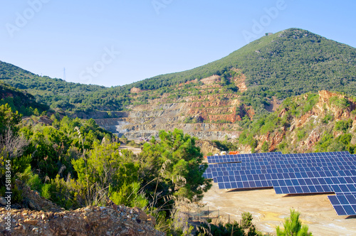 Solar panels in an old quarry of the Romans, Elba Island, Italy
