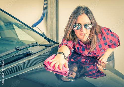 Photos Young beautiful woman cleaning her Car at Carwash