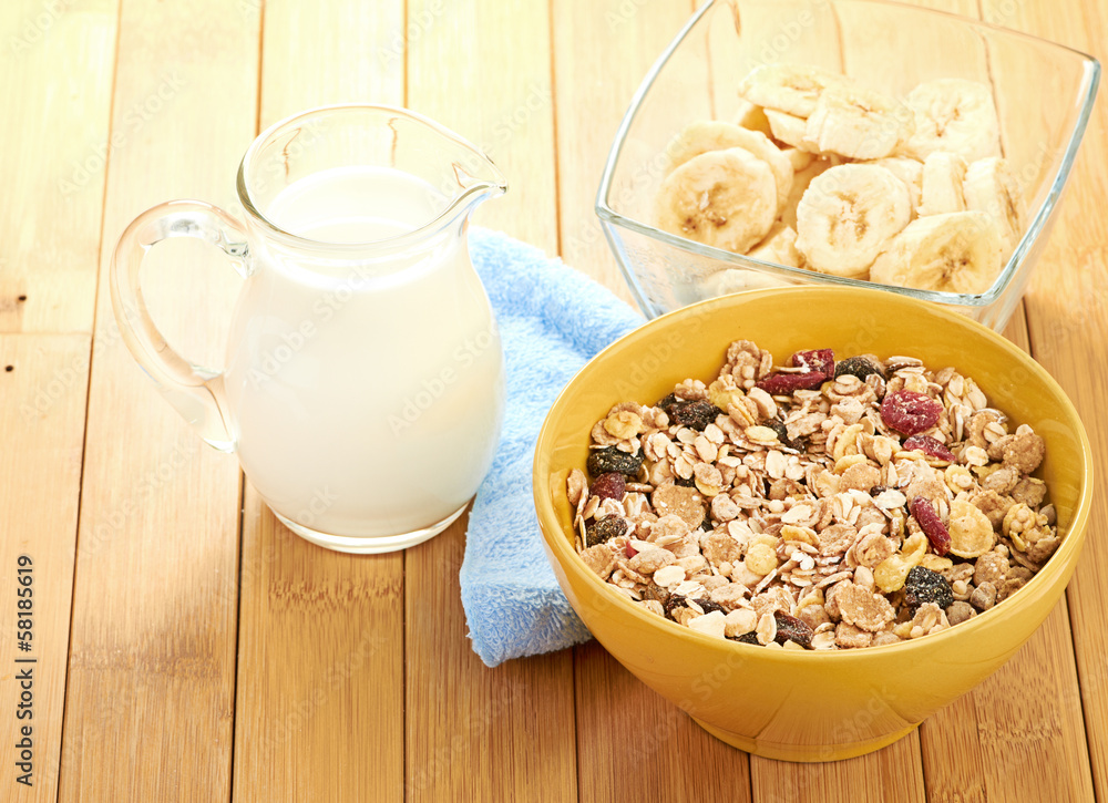 Delicious and healthy cereal in bowl with milk Delicious and healthy cereal in bowl with milk